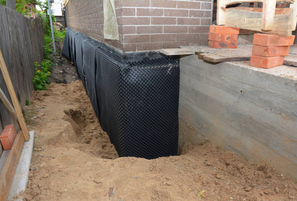 SJ Waterproofing Pros technician performing targeted Waterproofing assessment in La Center, WA
